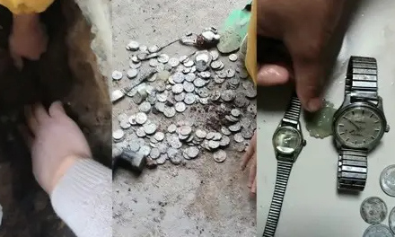 下水道挖出钱币手表玉器